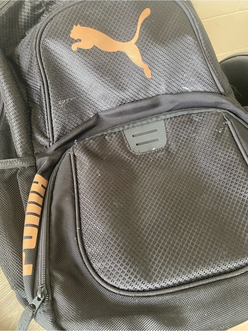 Puma Black Backpack with Metallic Copper Logo